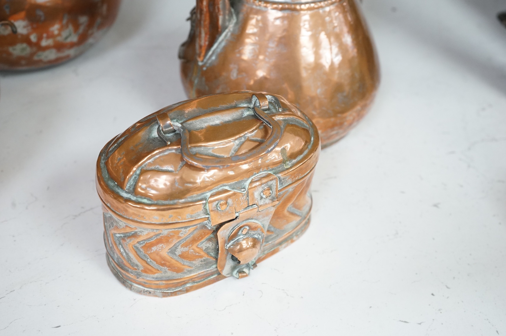 A collection of six various Arab copper vessels to include coffee pots, tallest 37cm
